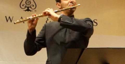 Arm position - Davide plays flute